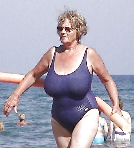 Old ladies with big tits in a swimsuit on the beach #38981756