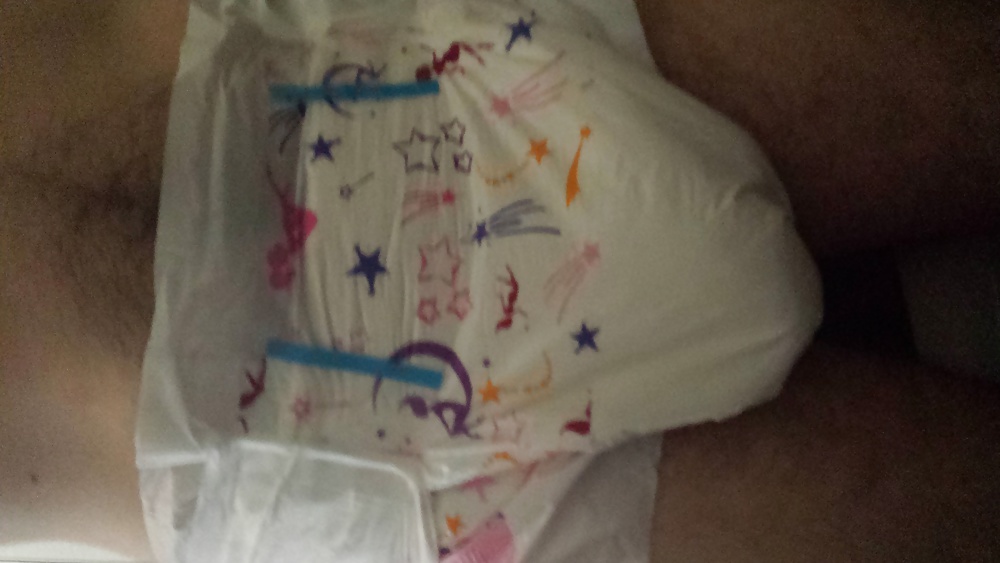 Wearing my girly pink and purple diaper. #29900831