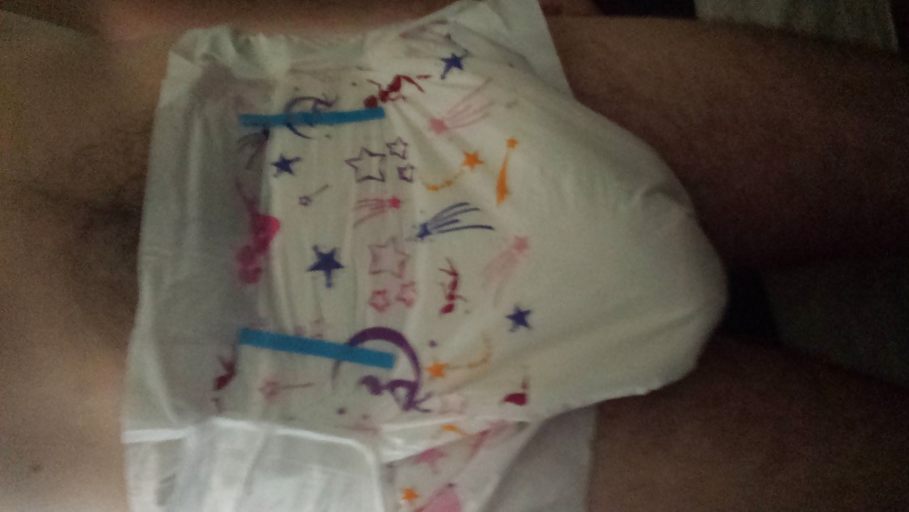 Wearing my girly pink and purple diaper. #29900845