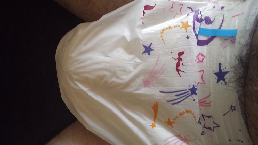 Wearing my girly pink and purple diaper. #29900923