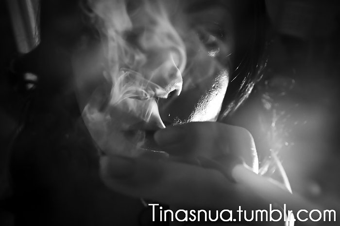 Tina Snua Smoking Cigarettes In A Holder #23680408