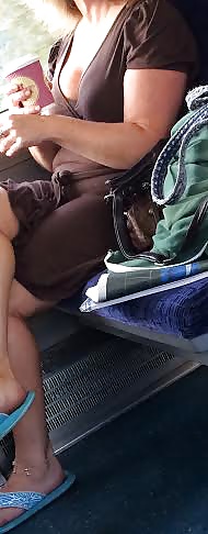 Candid milf flashing tits and legs on train #31227355