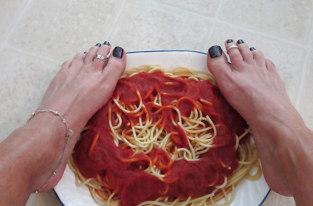 Girls feet covered in food #28668838