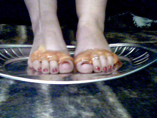 Girls feet covered in food #28668868