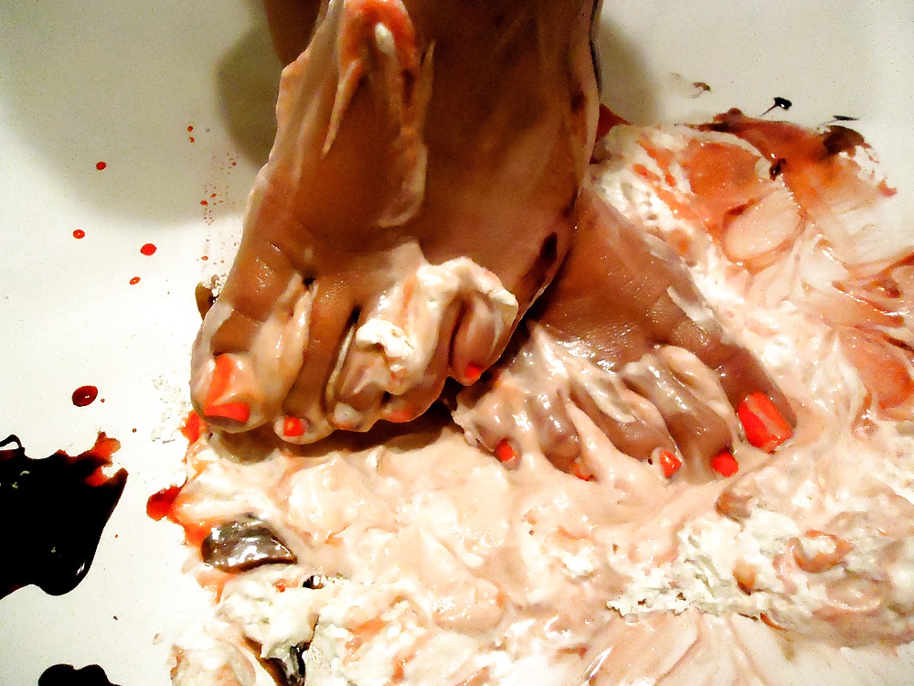 Girls feet covered in food #28669010