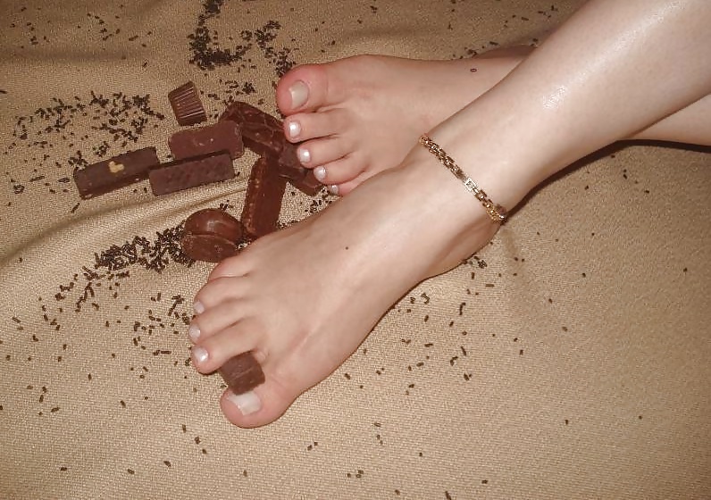 Girls feet covered in food #28669052