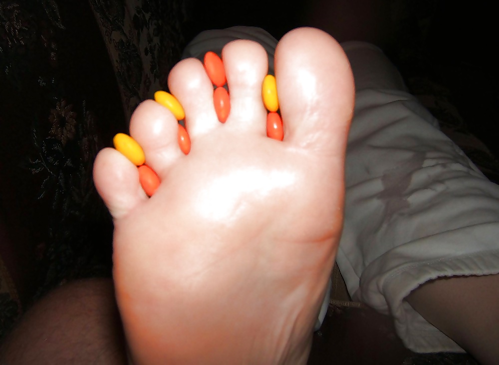 Girls feet covered in food #28669108