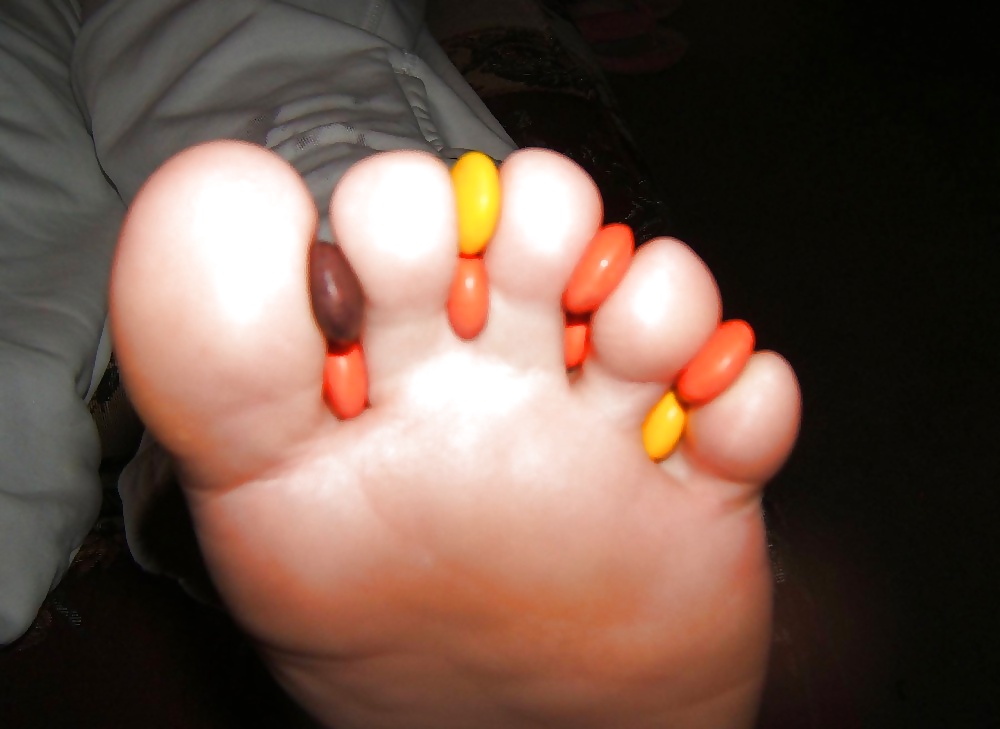 Girls feet covered in food #28669110