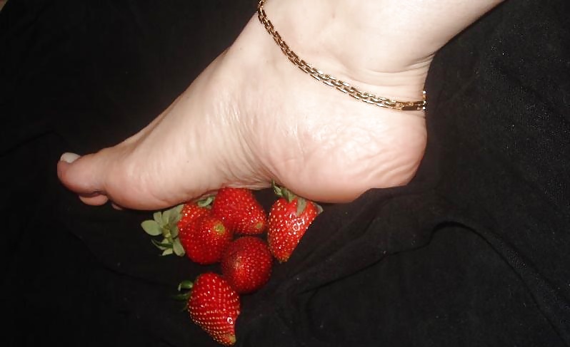 Girls feet covered in food #28669194