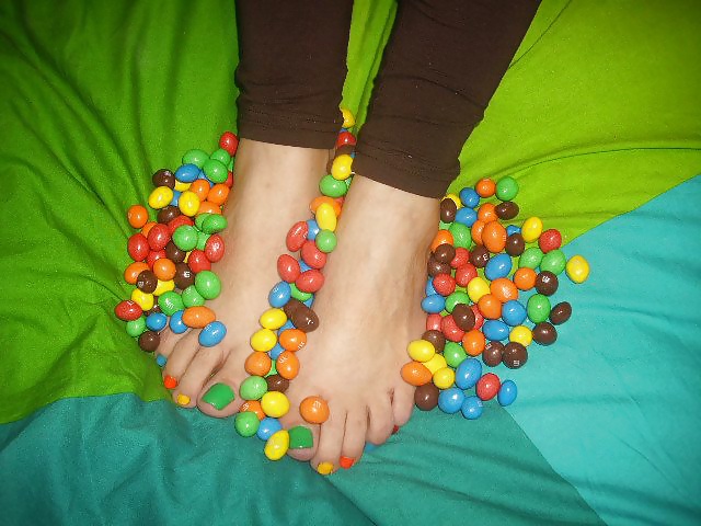 Girls feet covered in food #28669237