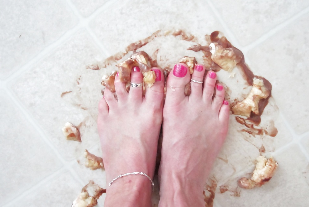 Girls feet covered in food #28669276