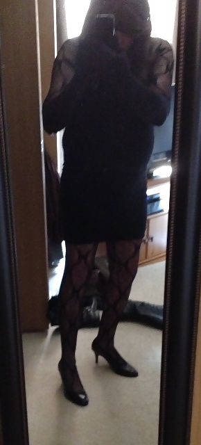 Black body stocking and heels
