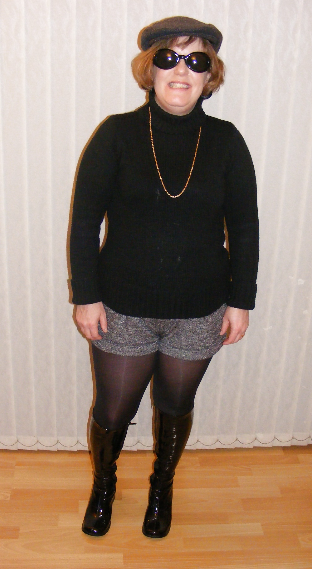 Shorts, shiny tights, and patent boots #35606248