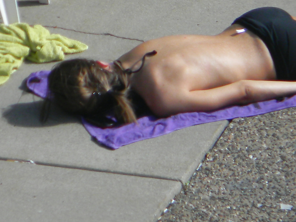 Teen flashes her titties sunbathing #22917558