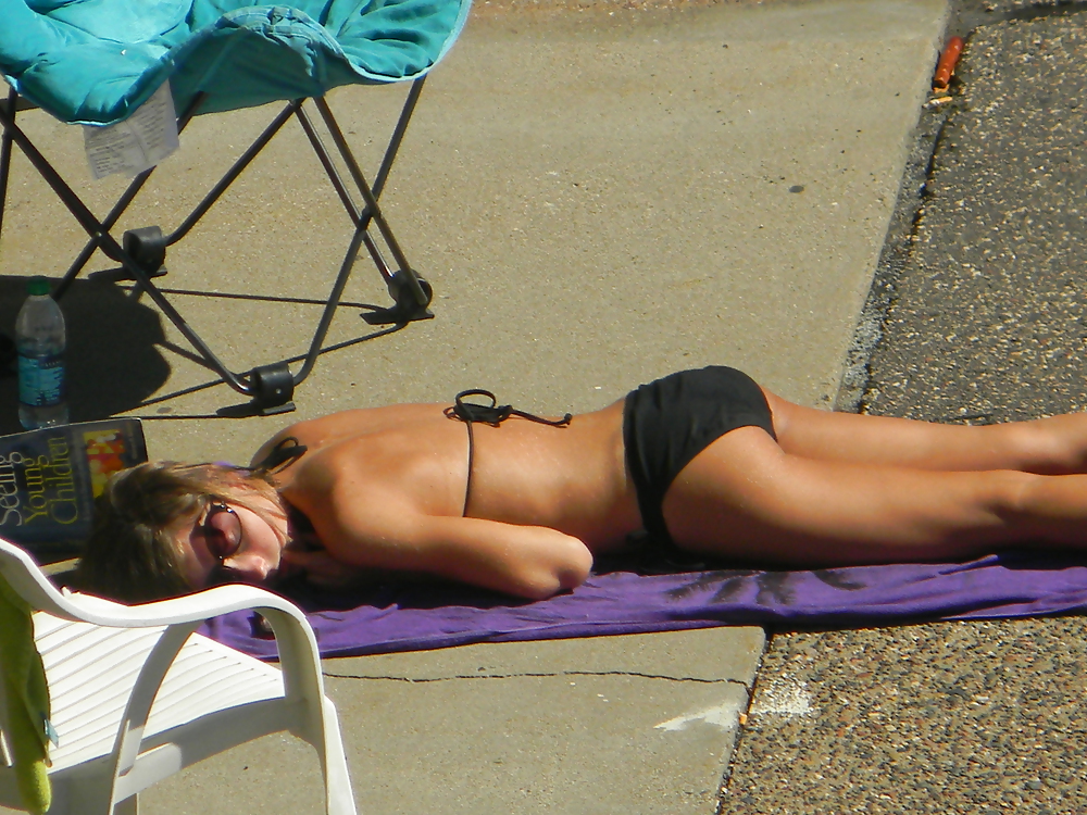 Teen flashes her titties sunbathing #22917791