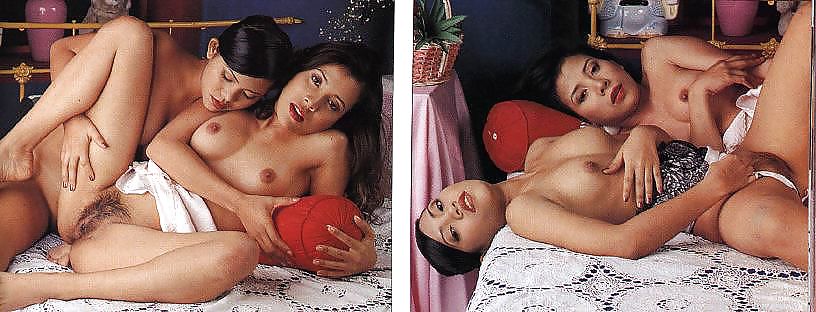 Una coppia di ragazze asiatiche che si intrattengono a vicenda
 #34739521