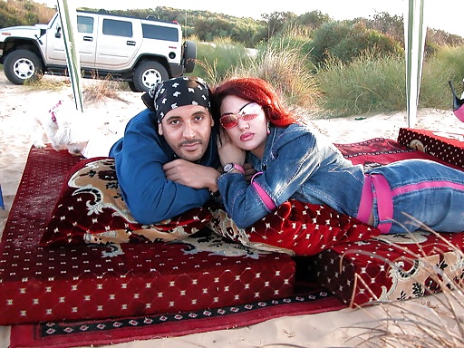 El hijo de Kadhafi y su novia de vacaciones 
 #31341918