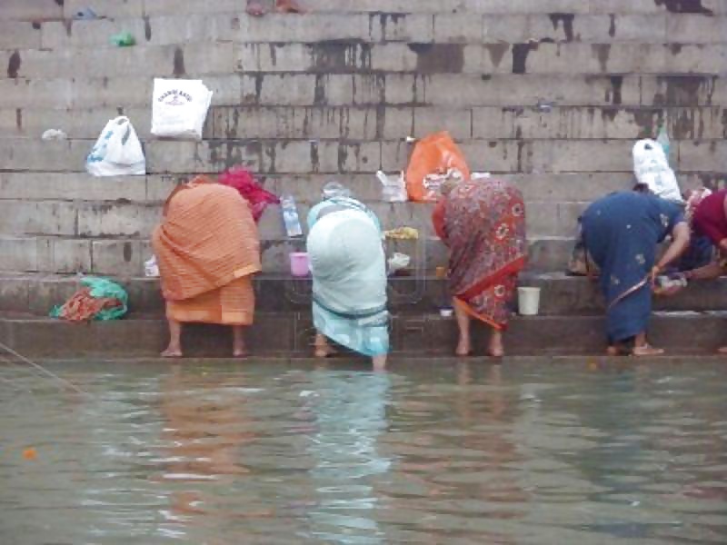 Indian women bending over in Varanasi #24836354