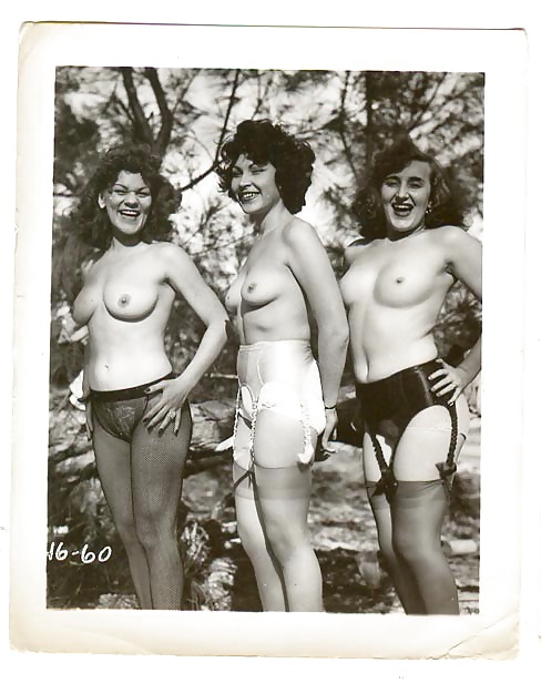 Three women posing for pictures #25871375