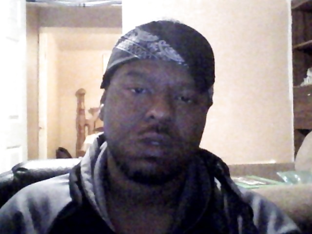 Black man with black bandanna  #26389460