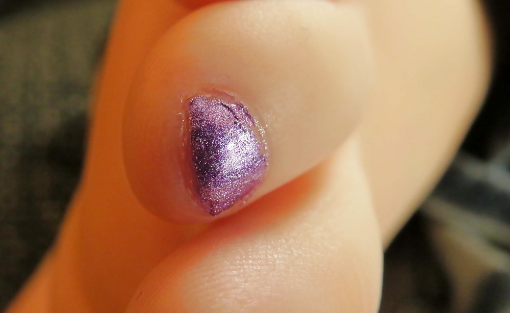 Barefeet and purple nails #28949473