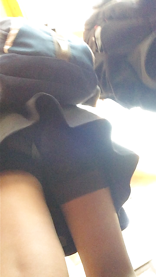 Quick upskirt of cute girl with a pantyhose and white thong