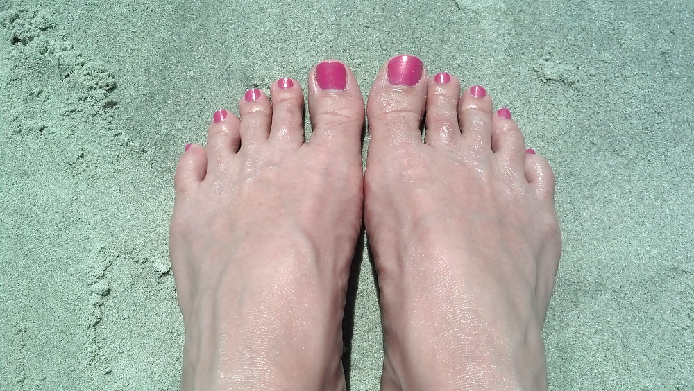 Feet at the beach.  #26984065