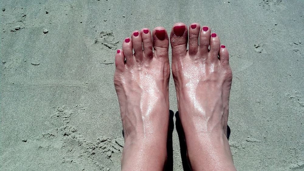 Feet at the beach.  #26984073