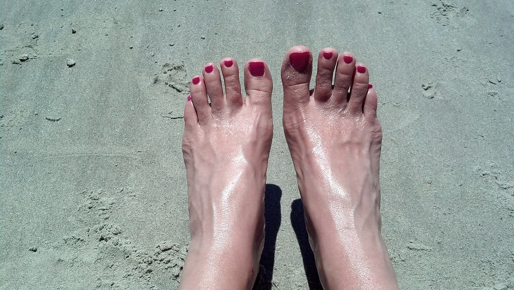 Feet at the beach.  #26984082