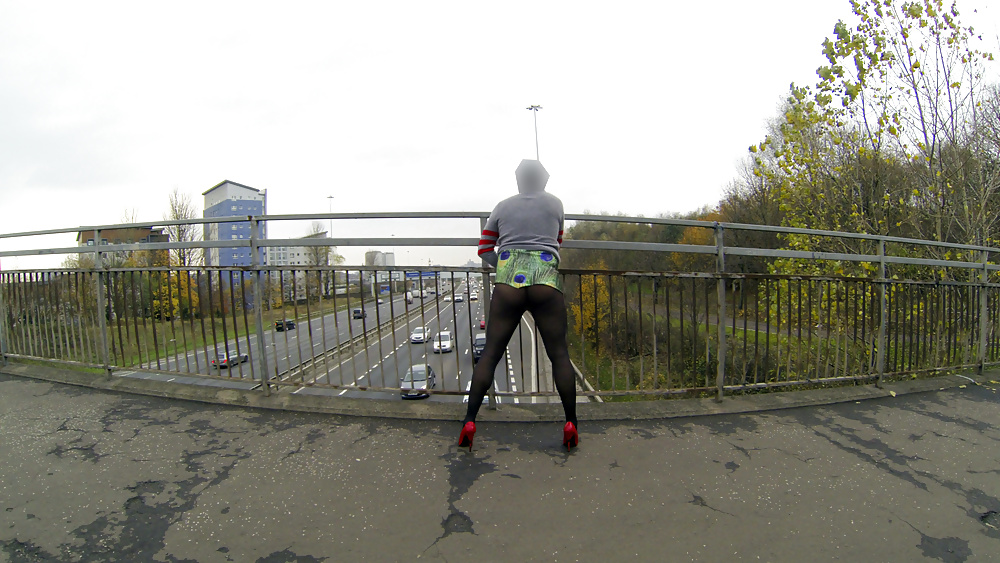 Public upskirt flash on bridge over traffic #38766814