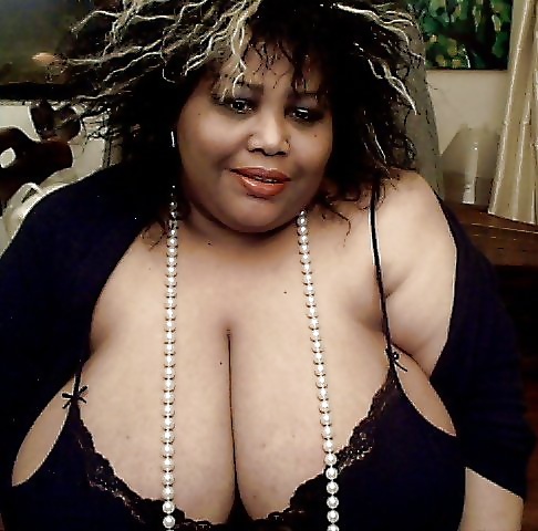 Big black boobs clothed #24661476