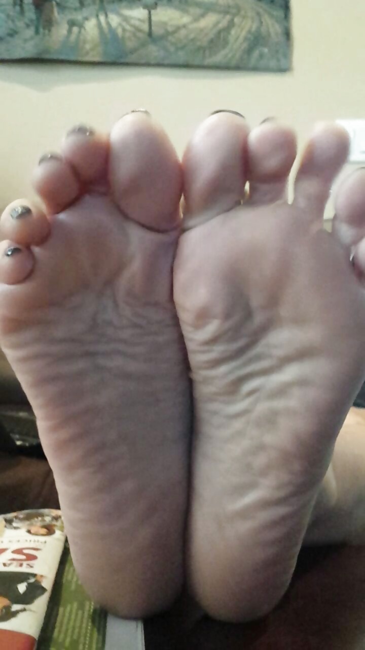 Sexy soles propped up on the table.  #38622287