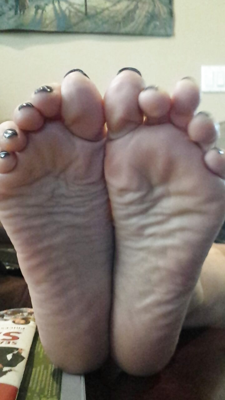 Sexy soles propped up on the table.  #38622296
