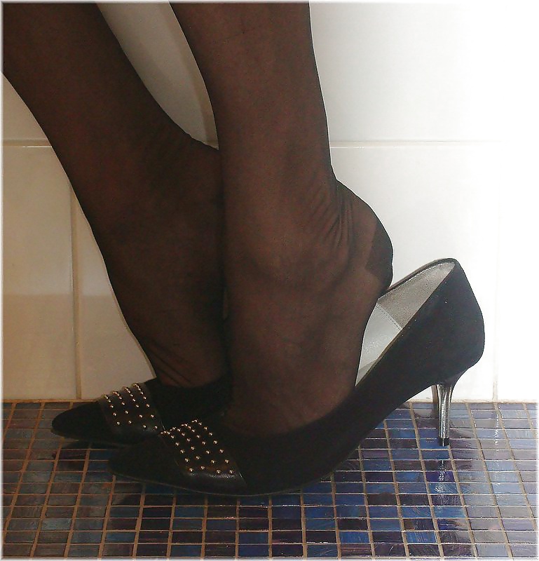 I play with my shoes in black stockings - Close up #24197140
