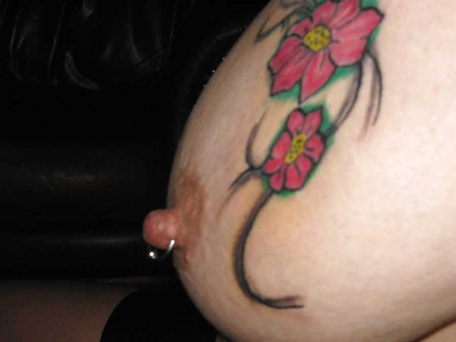 Pierced and tattooed tits #26450836