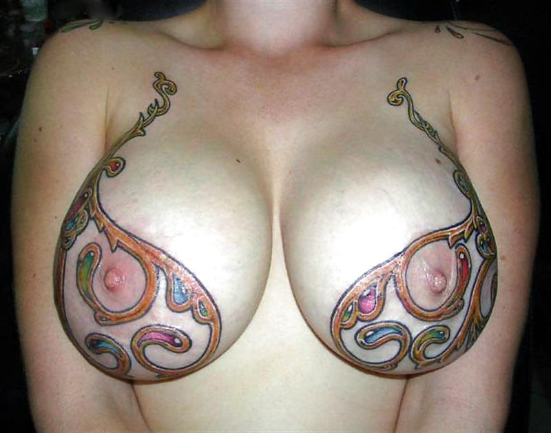 Pierced and tattooed tits #26450866