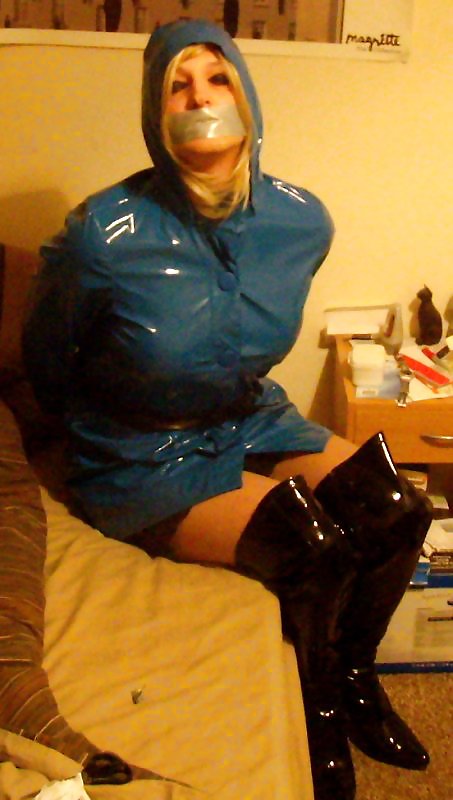 Blue PVC raincoat and thigh boots #36360017