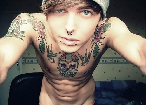 Body Art. Tattoos And Piercings #25145647