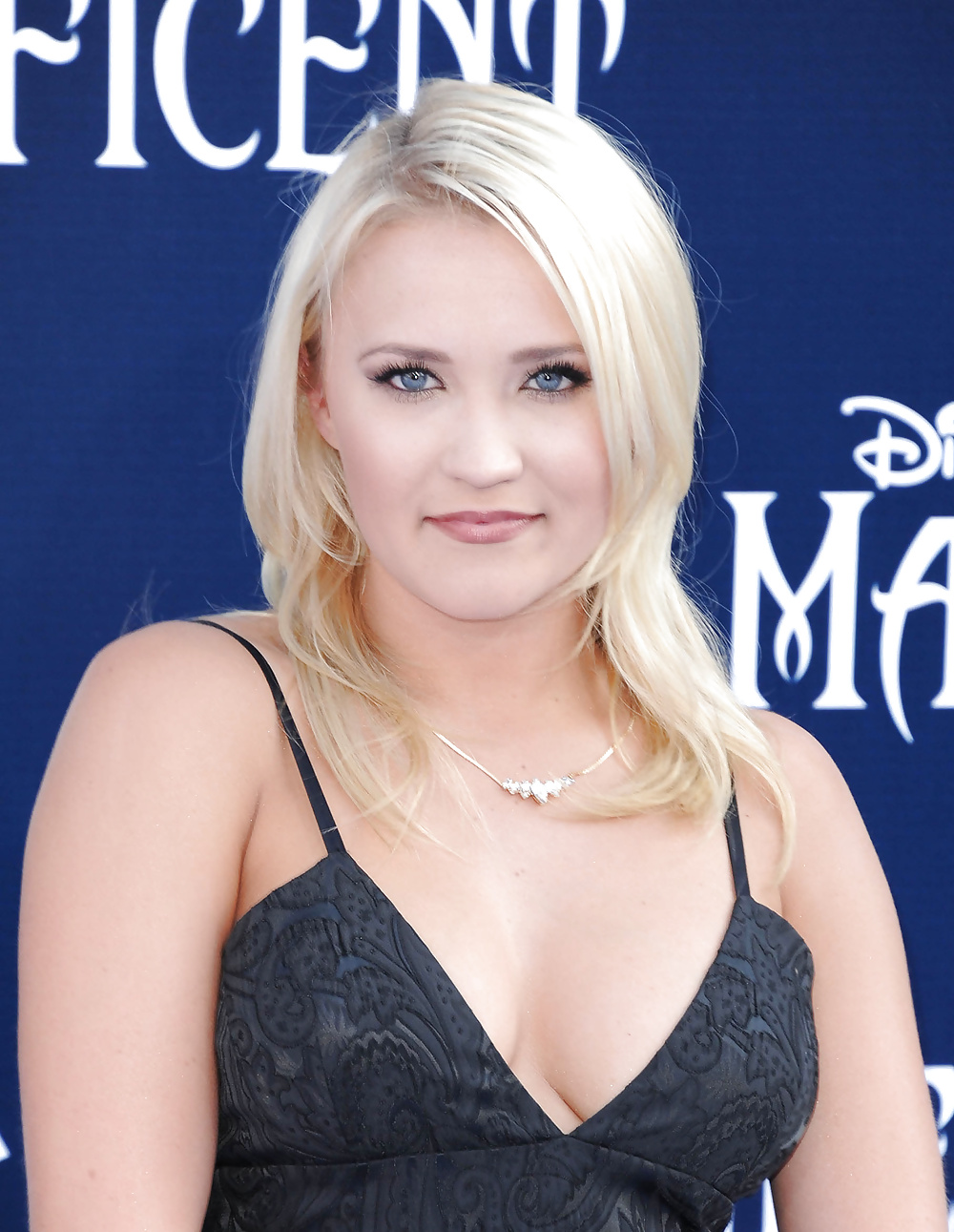 Emily osment - busts out for disneys maleficent
 #26674656