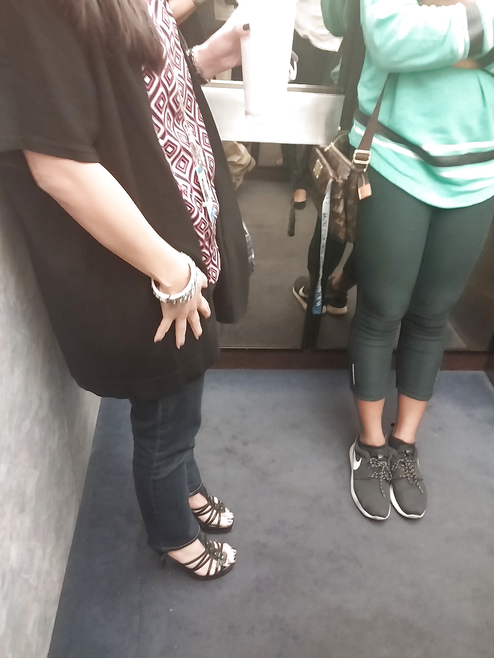 Moving co-workers in jeans and heels 