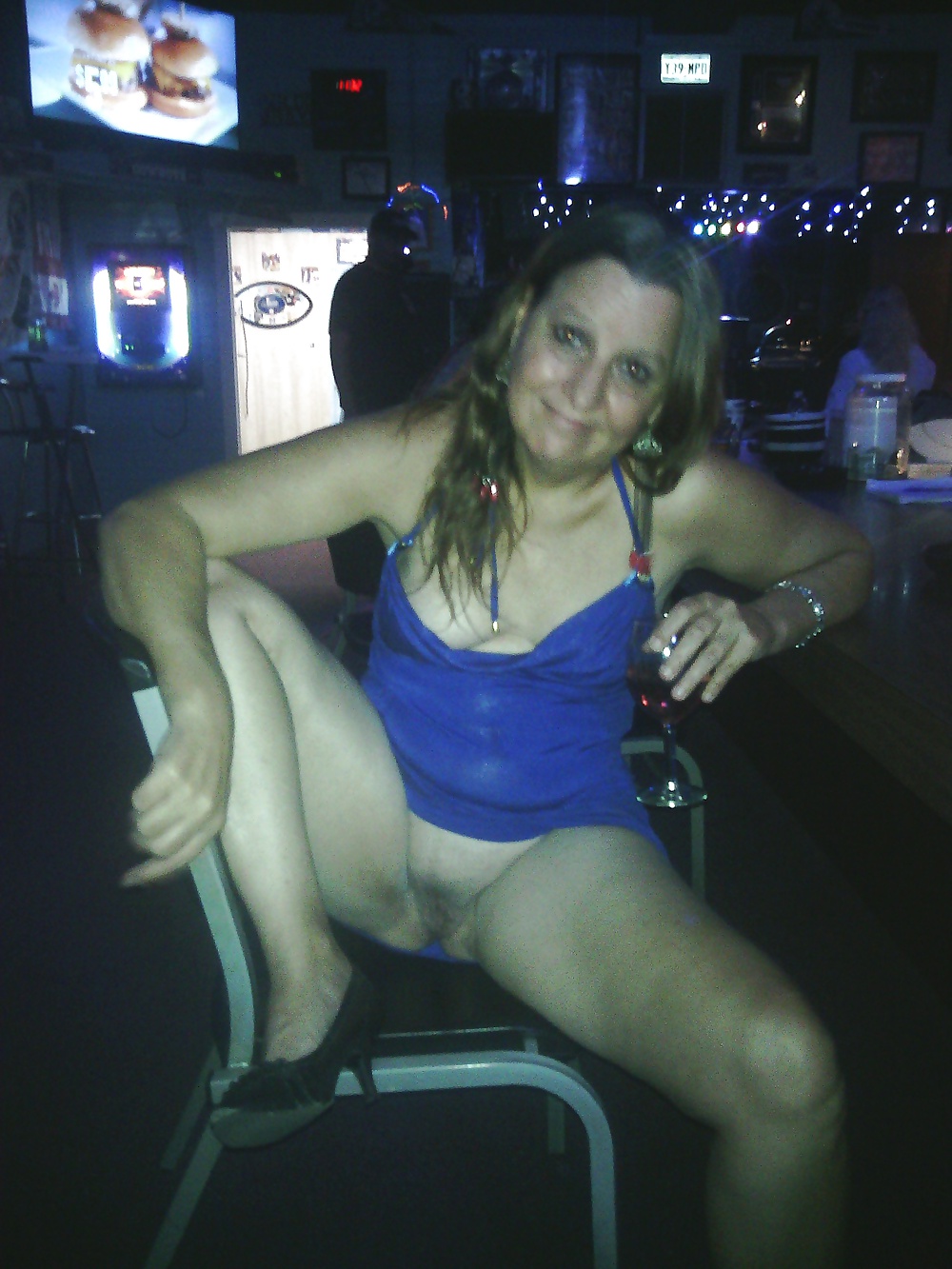 Flashing her pussy at the bar #29195617