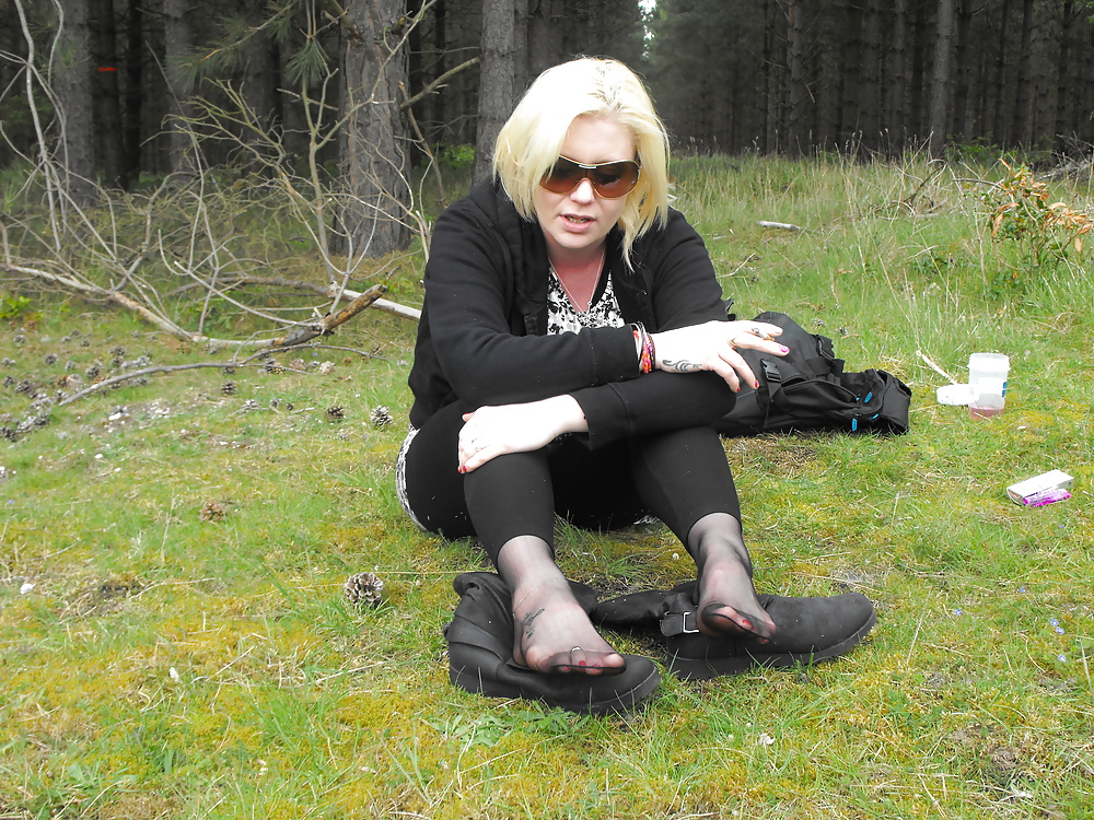 Em showing her sexy feet in the forest in black tights #28513740