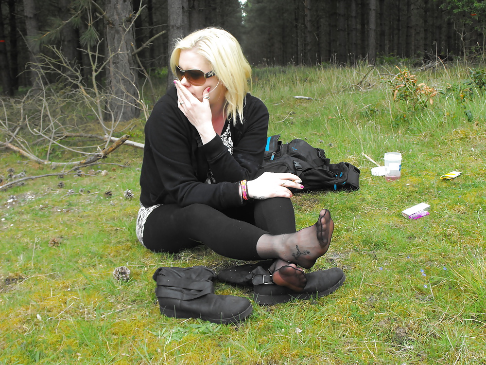 Em showing her sexy feet in the forest in black tights #28513757