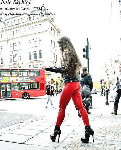 Most sexy girl in street leatherlook legging & loub. boots #26594289