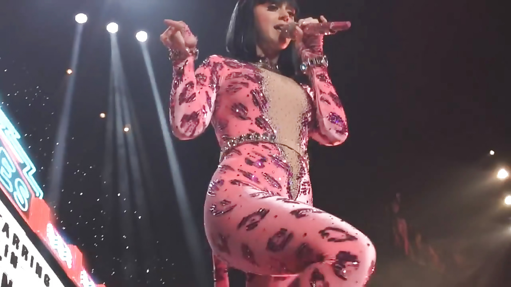 Katy perry in a pink catsuit
 #31697248