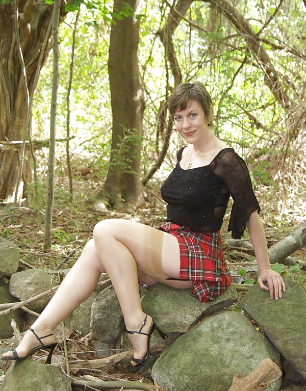 The lovely Miss Jones wears tartan skirt. #30846503