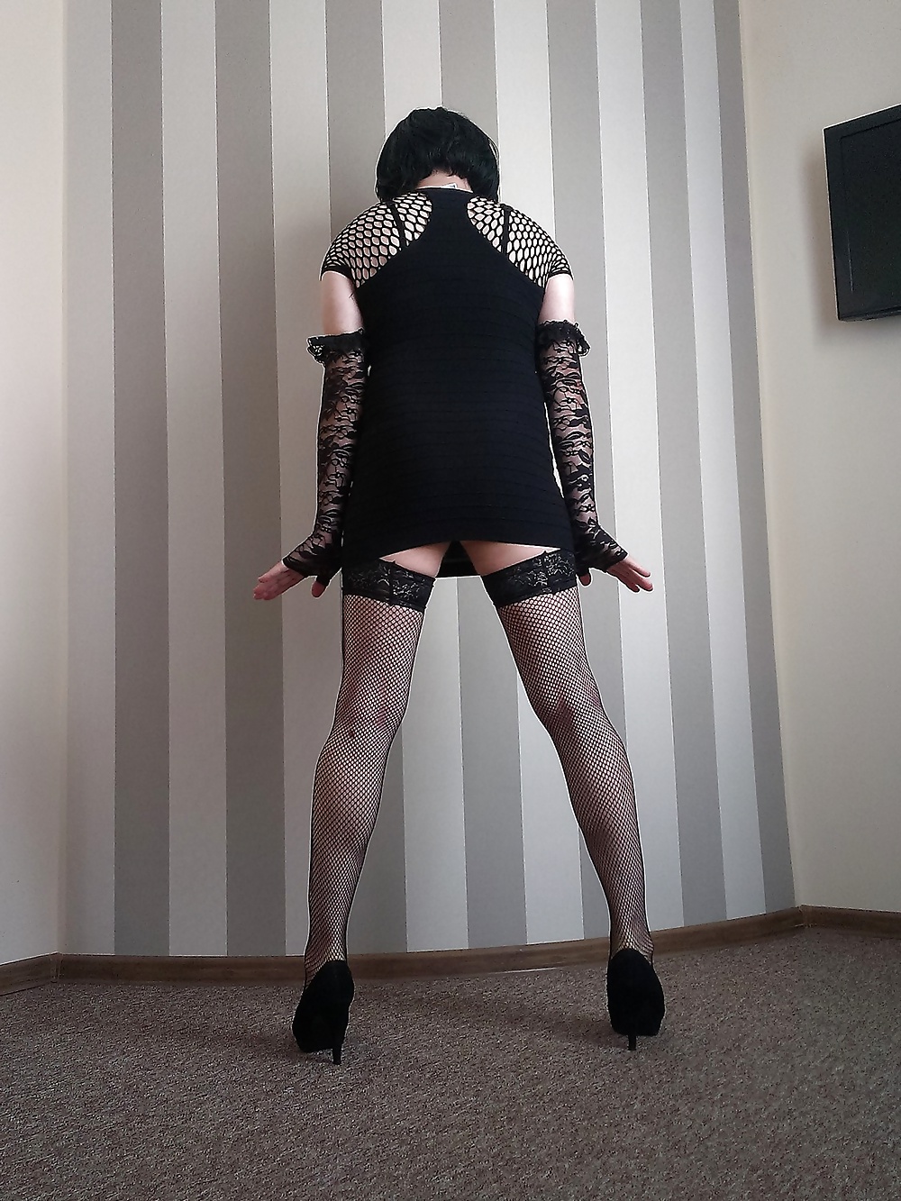 In a hotel room - black minidress, stockings and heels  #28504303