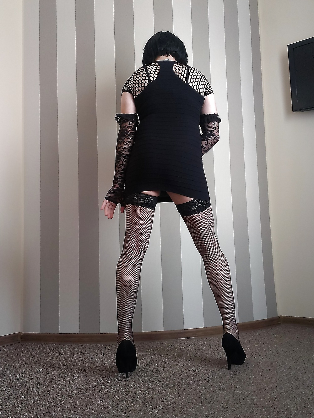 In a hotel room - black minidress, stockings and heels  #28504325
