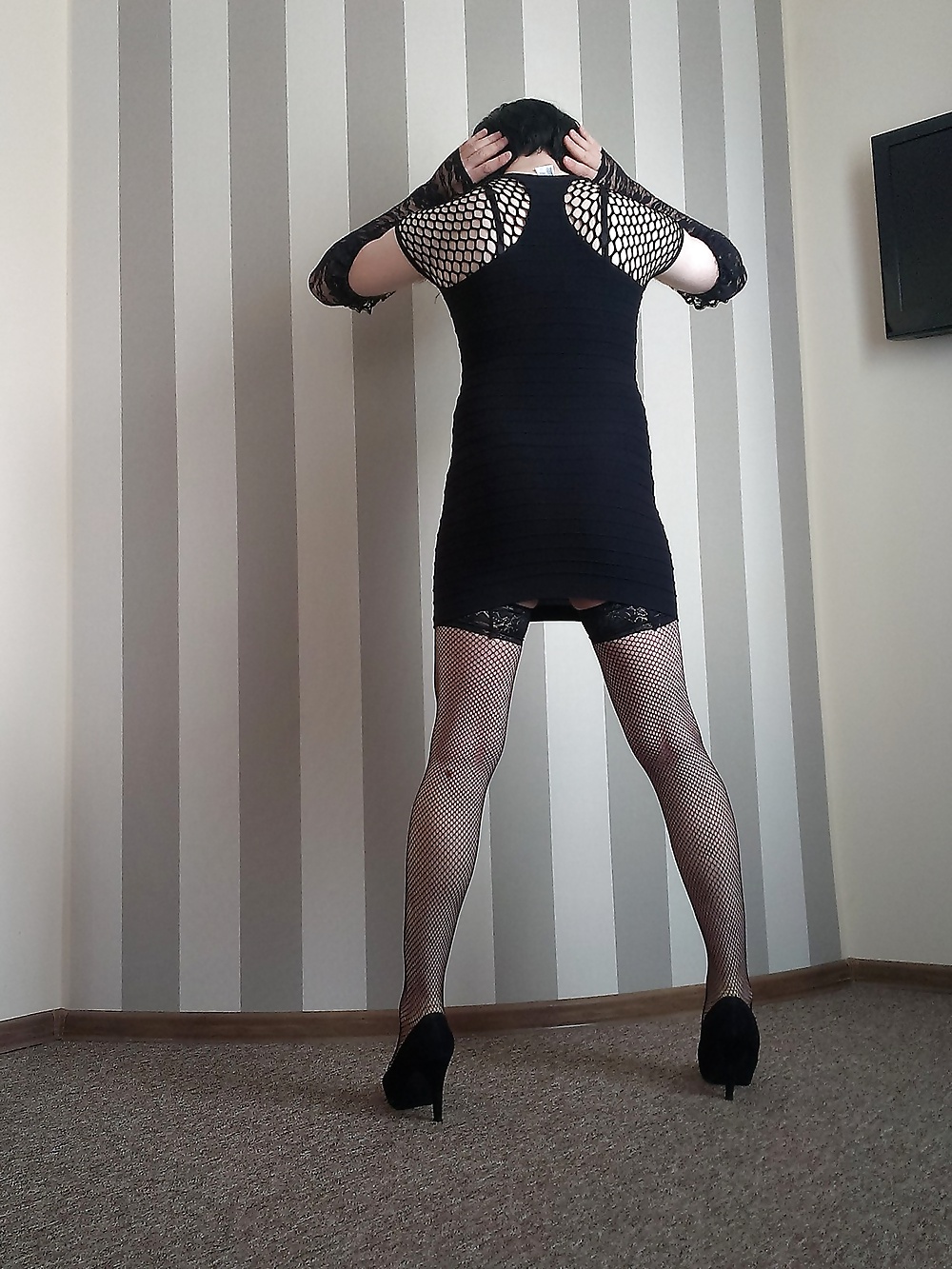 In a hotel room - black minidress, stockings and heels  #28504331