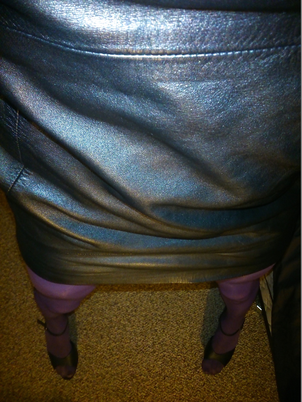 Feet And Legs In Purple Stockings, Leather Dress And Heels #33525520